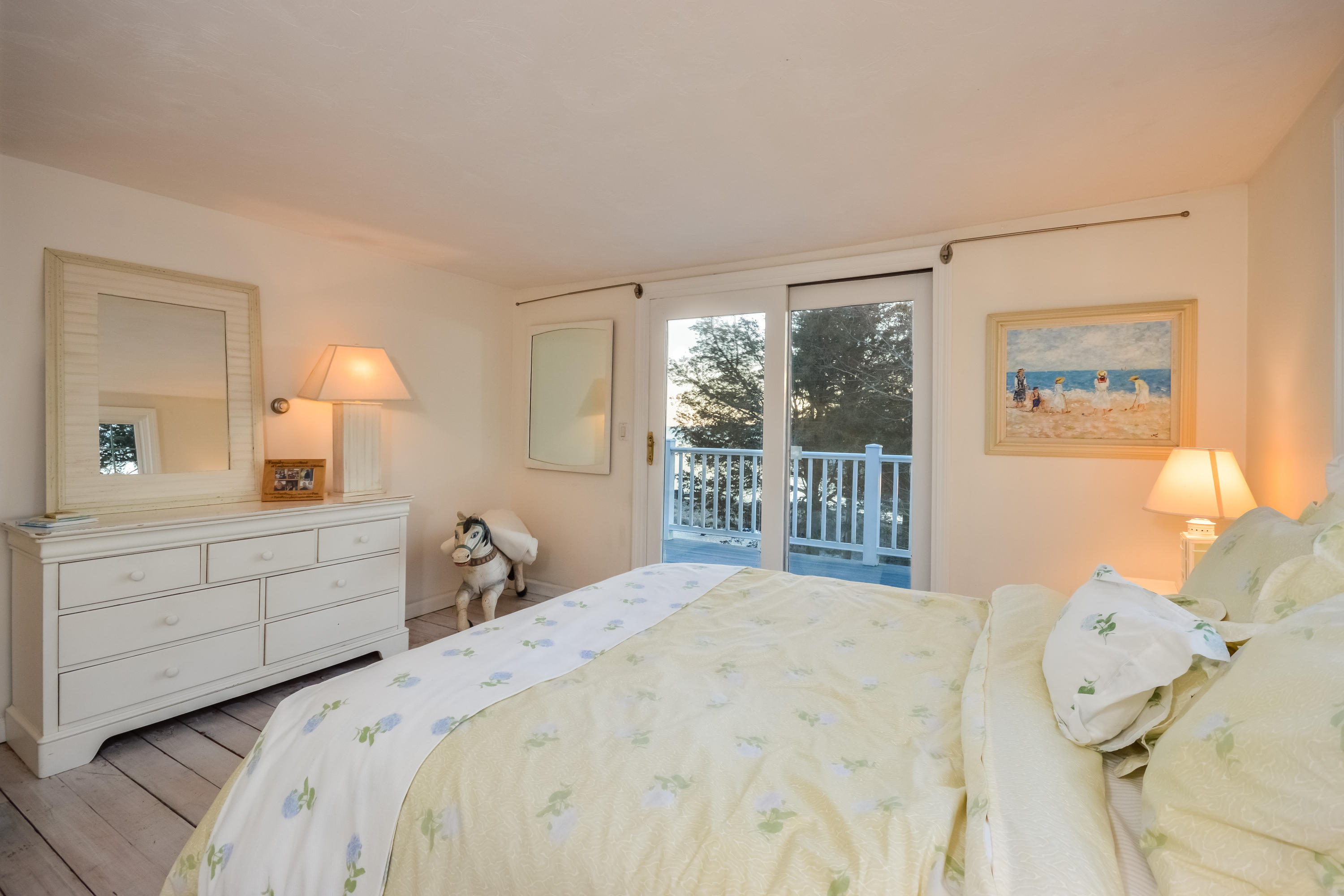 310 Shore Road Bourne, MA 02532 - Photo 22 of 31 a bedroom with a large bed and a window