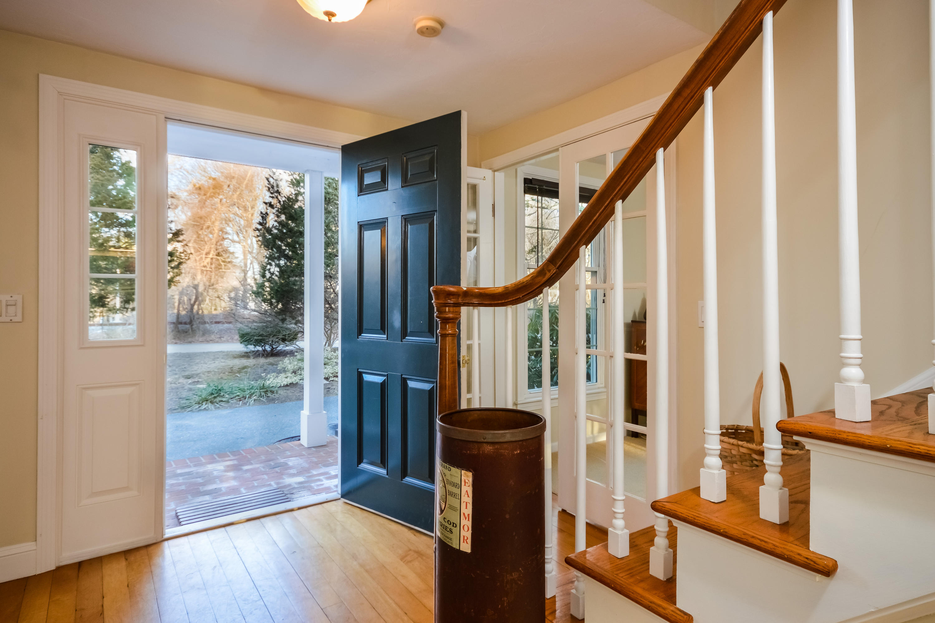 310 Shore Road Bourne, MA 02532 - Photo 10 of 31 a view of an entryway with wooden floor and windows