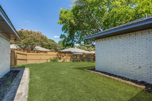 a house view with a garden space