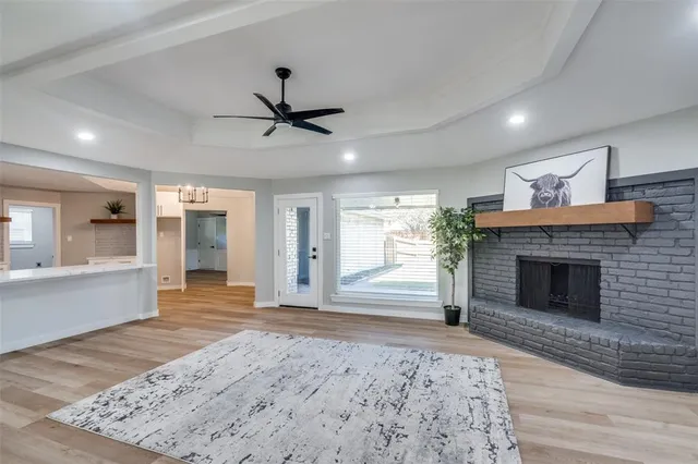 a bedroom with a bed and a fireplace