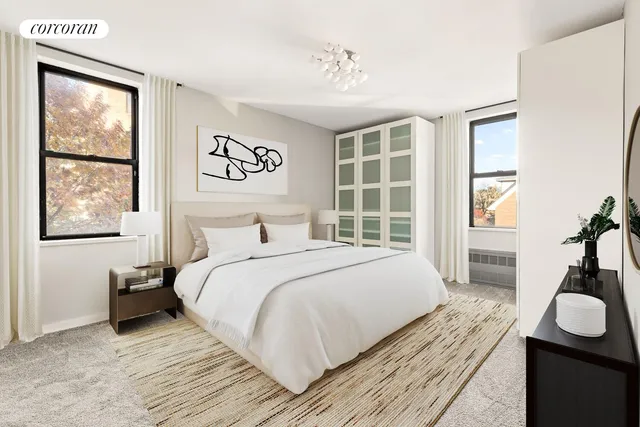 a view of a kitchen with a sink and a refrigerator
