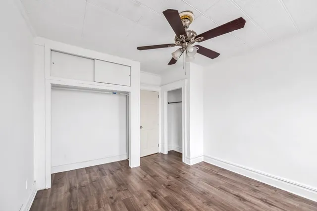 a view of room with a ceiling fan