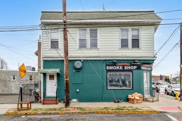 a front view of a building with glass windows