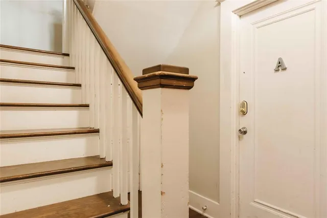 a view of a hallway with closet