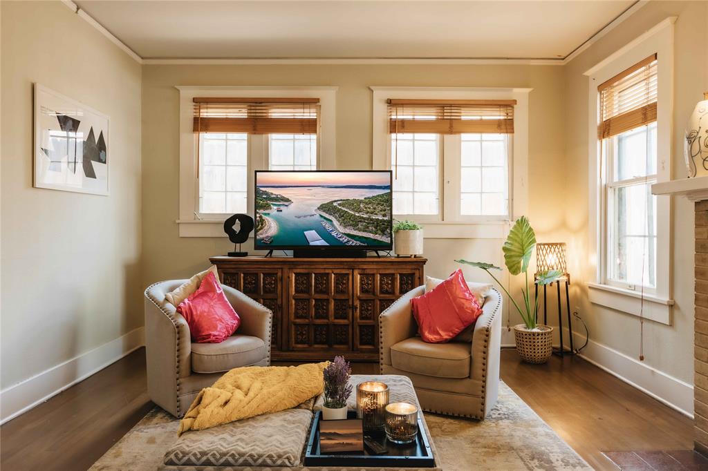 2623 Salado Street Austin, TX 78705 - Photo 14 of 36 a bedroom with furniture and a window