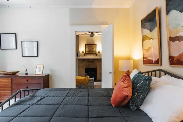 a bed room with a bed and a window