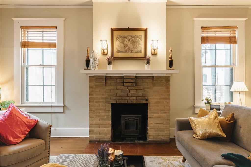 2623 Salado Street Austin, TX 78705 - Photo 4 of 36 a living room with furniture and a fireplace