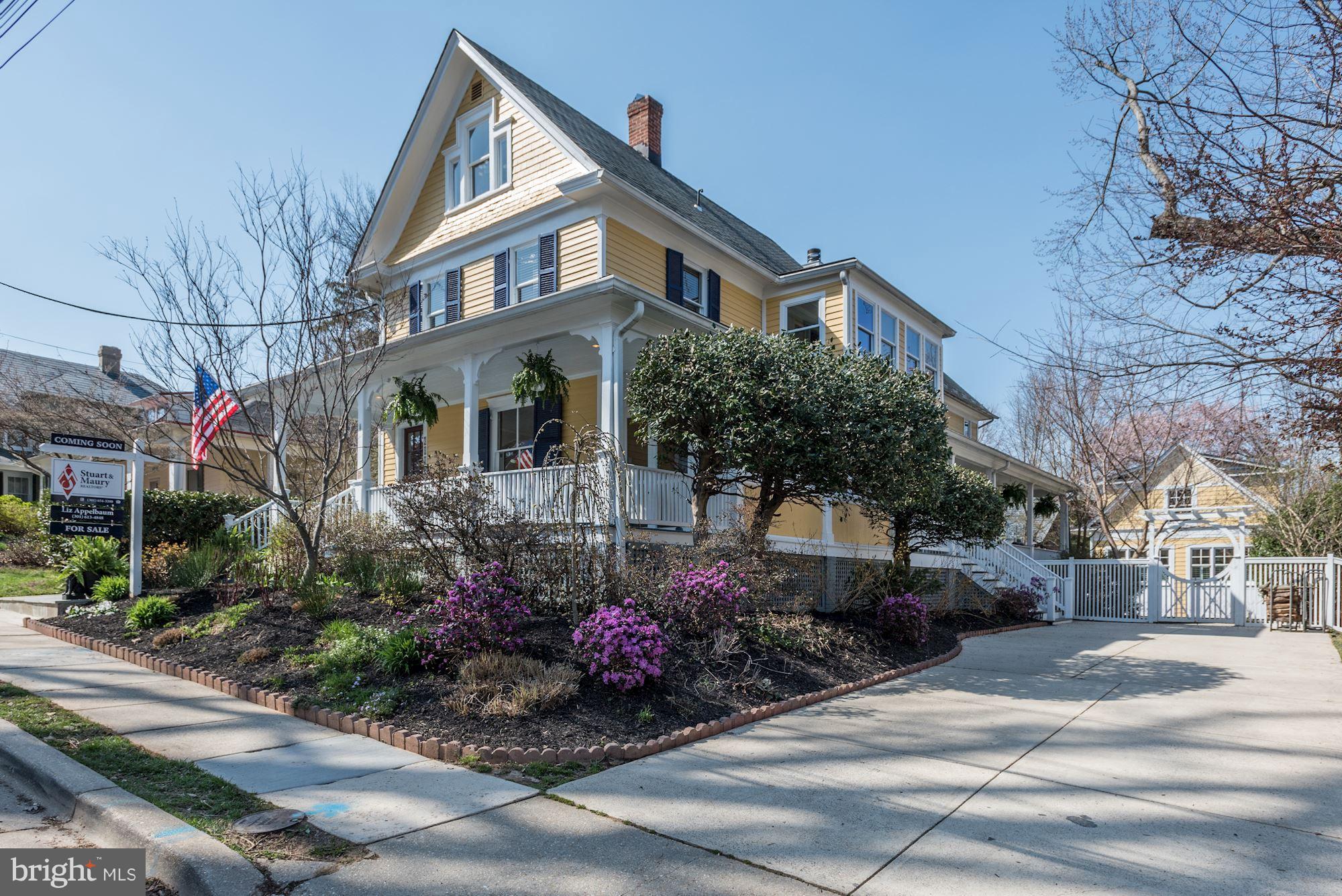 3807 Williams Lane Chevy Chase, MD 20815 - Photo 2 of 30 a front view of a house with a yard and a street