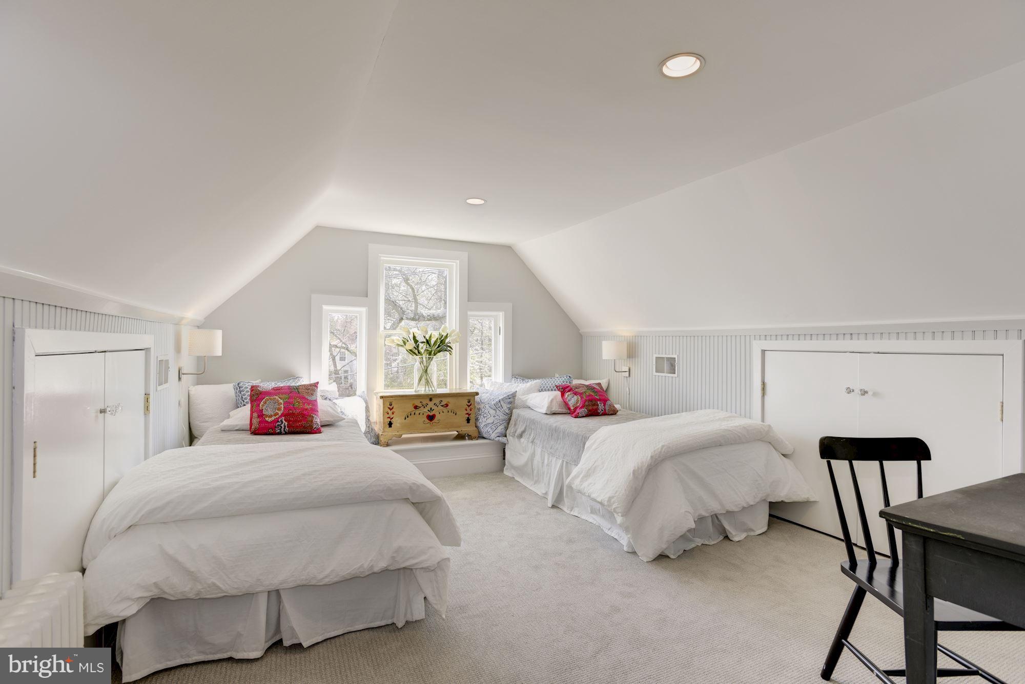 3807 Williams Lane Chevy Chase, MD 20815 - Photo 24 of 30 a bedroom with two beds and a window