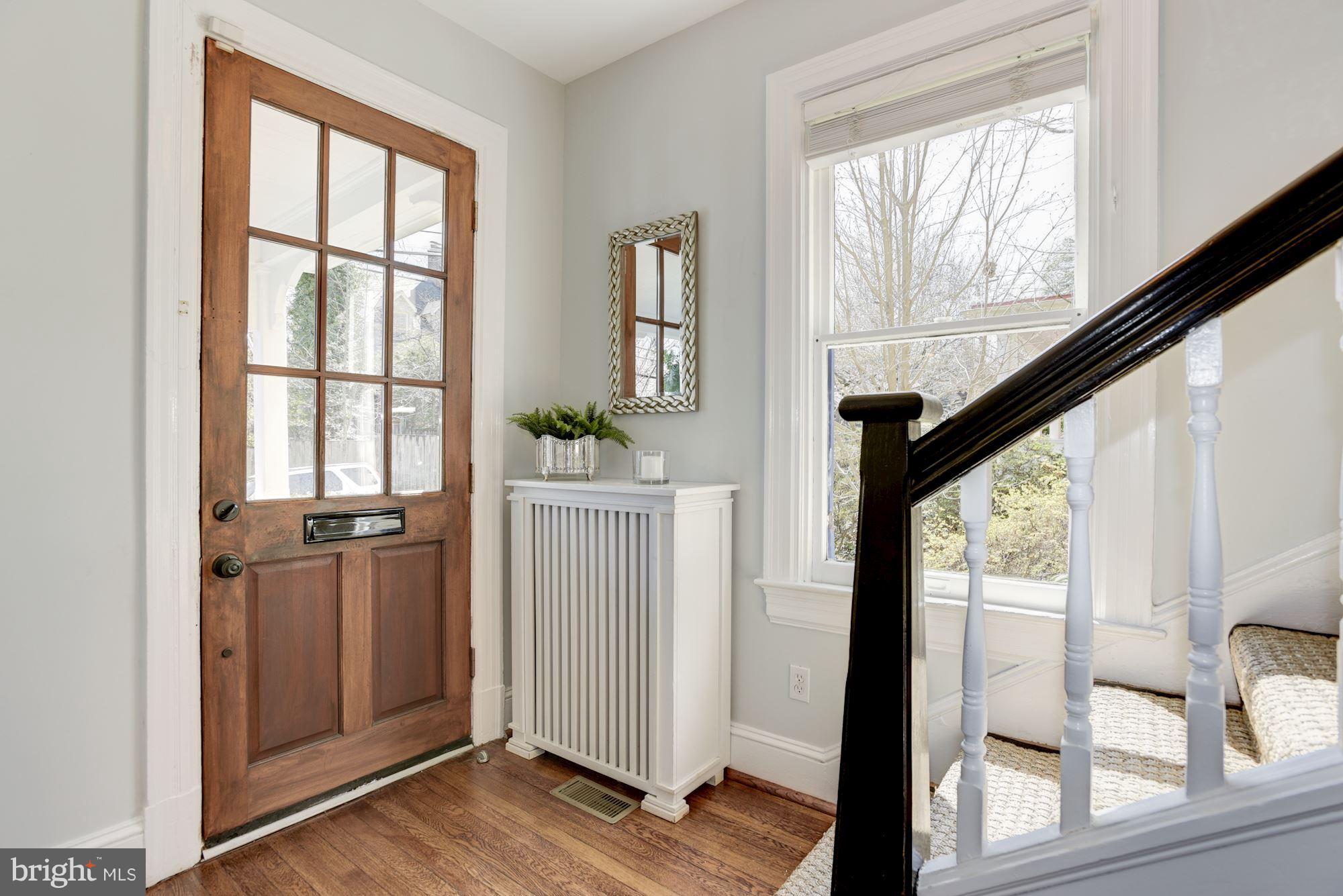 3807 Williams Lane Chevy Chase, MD 20815 - Photo 5 of 30 a view of an entryway with wooden floor and windows