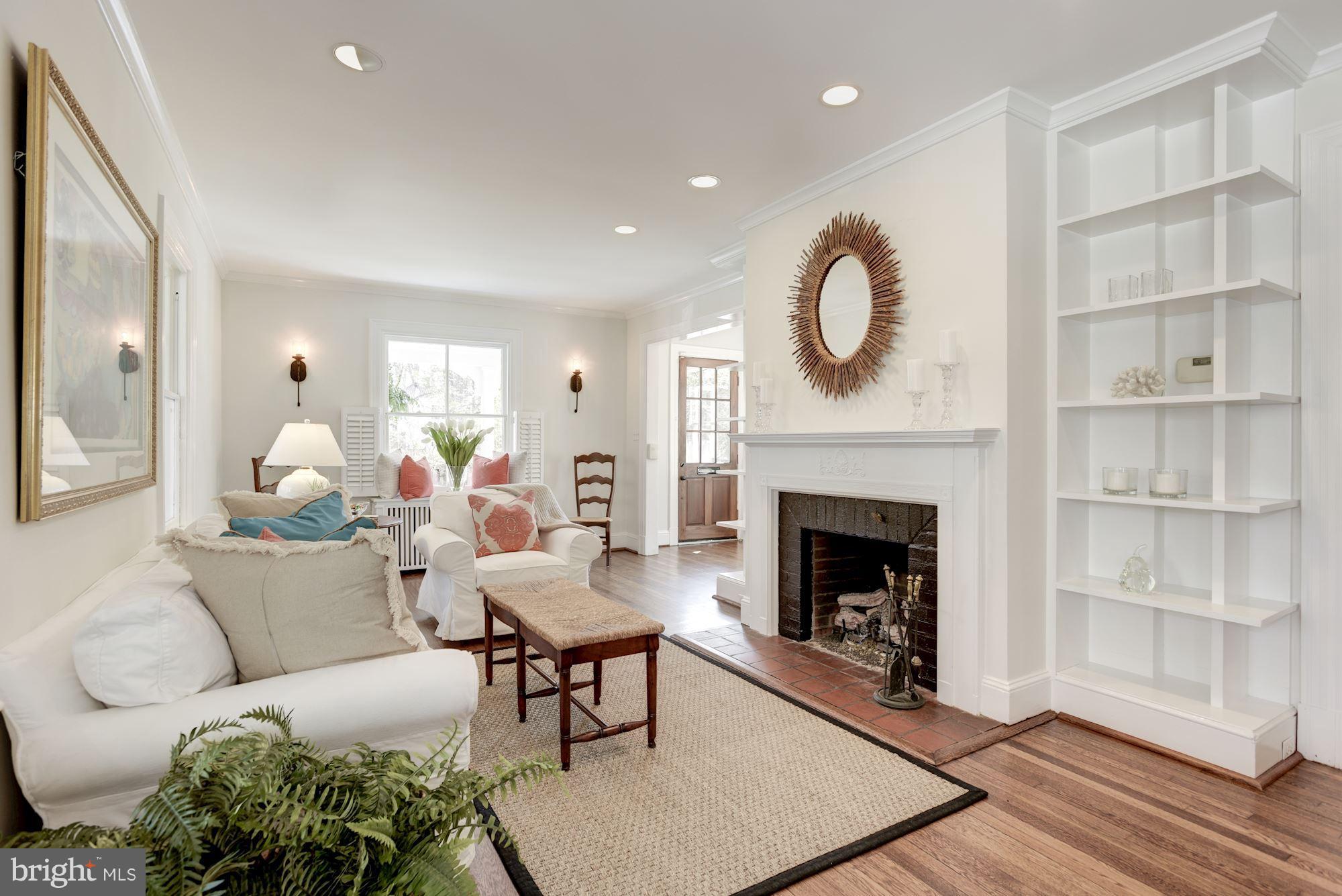 3807 Williams Lane Chevy Chase, MD 20815 - Photo 6 of 30 a living room with furniture fireplace and wooden floor