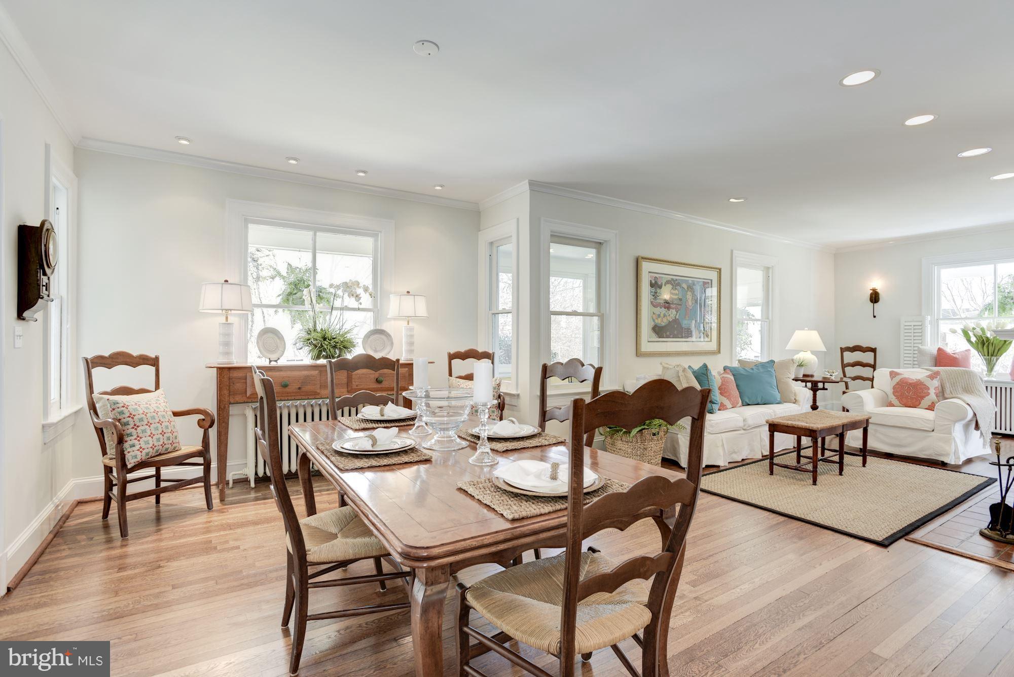 3807 Williams Lane Chevy Chase, MD 20815 - Photo 8 of 30 a dining room with furniture a window and wooden floor