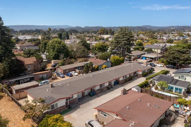 an aerial view of a city with lots of residential buildings