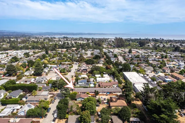an aerial view of a city with lots of residential buildings