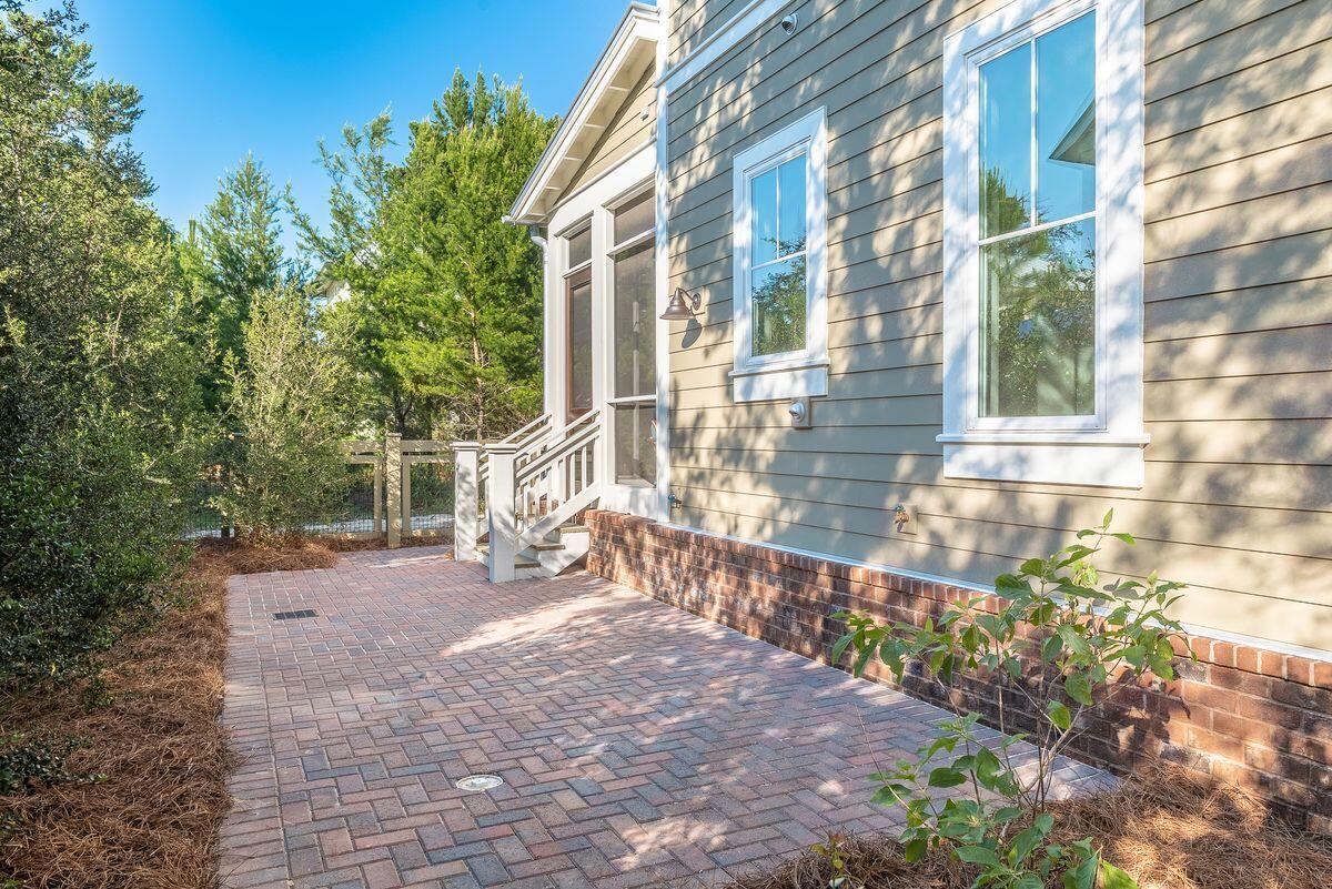 25 Pontchartrain North Santa Rosa Beach, FL 32459 - Photo 21 of 48 a view of a brick building next to a yard