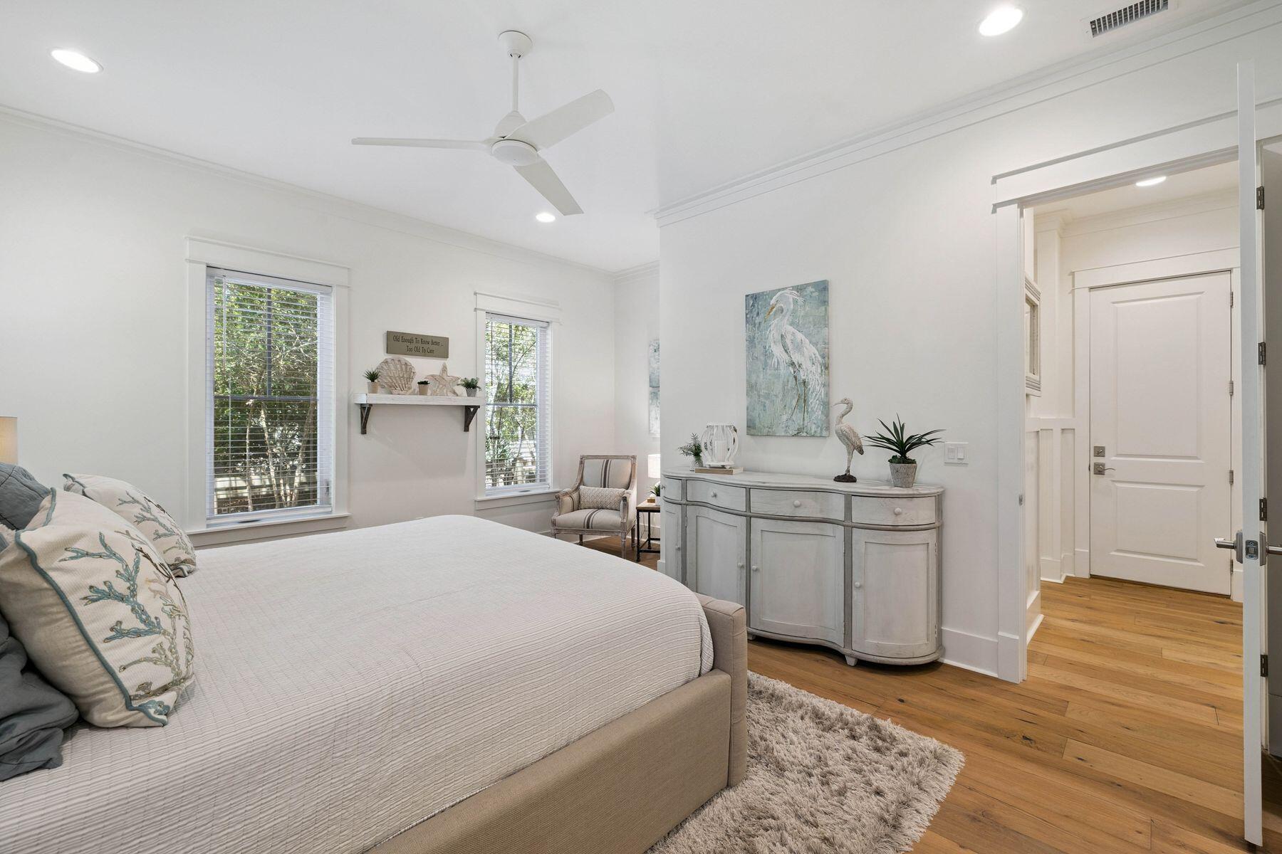 25 Pontchartrain North Santa Rosa Beach, FL 32459 - Photo 23 of 48 a spacious bedroom with a large bed and a dresser