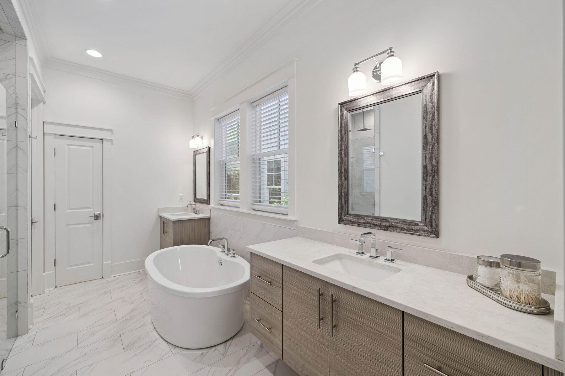 25 Pontchartrain North Santa Rosa Beach, FL 32459 - Photo 25 of 48 a bathroom with a granite countertop sink toilet and a mirror
