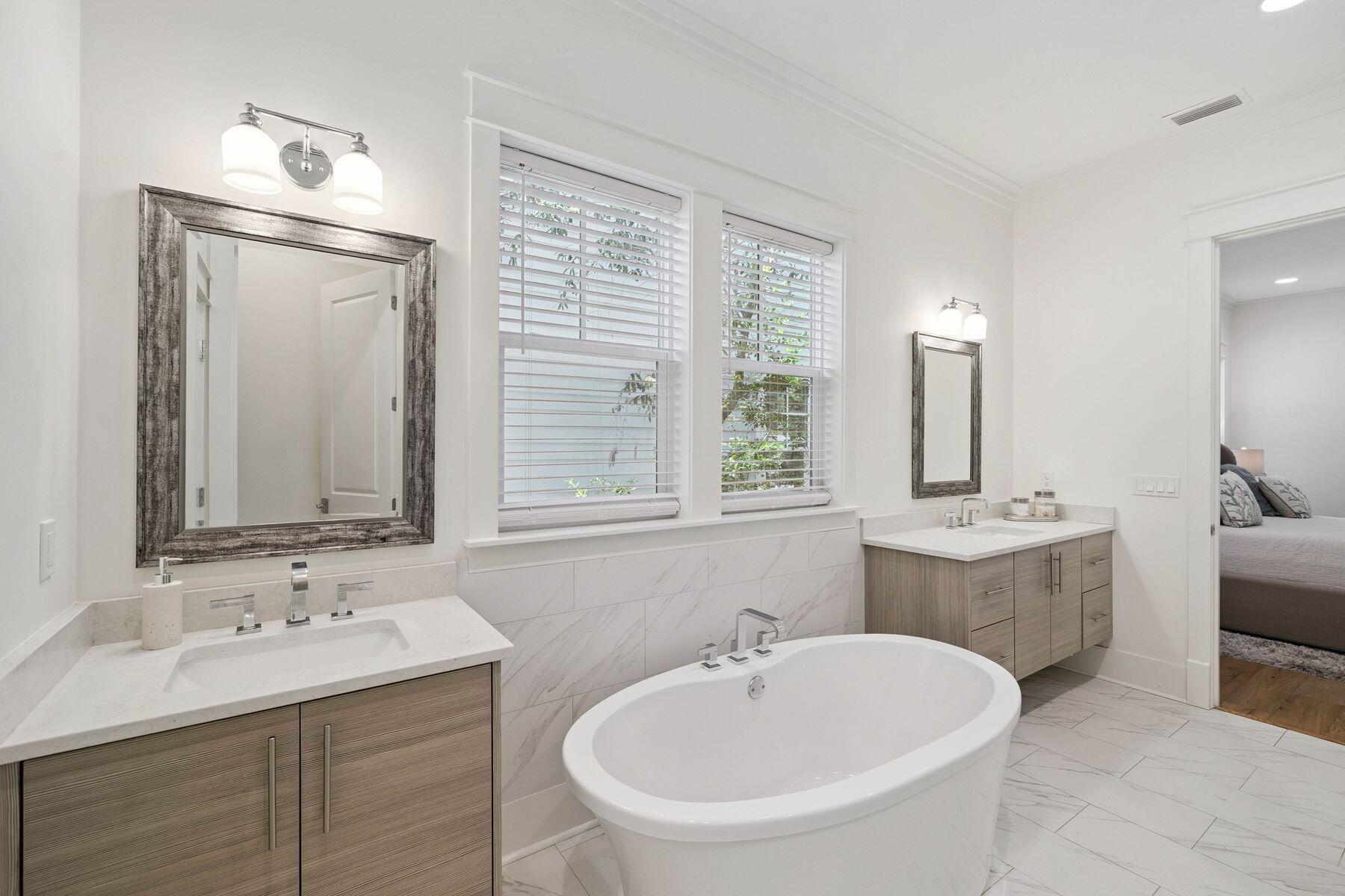 25 Pontchartrain North Santa Rosa Beach, FL 32459 - Photo 27 of 48 a bathroom with a sink and a mirror