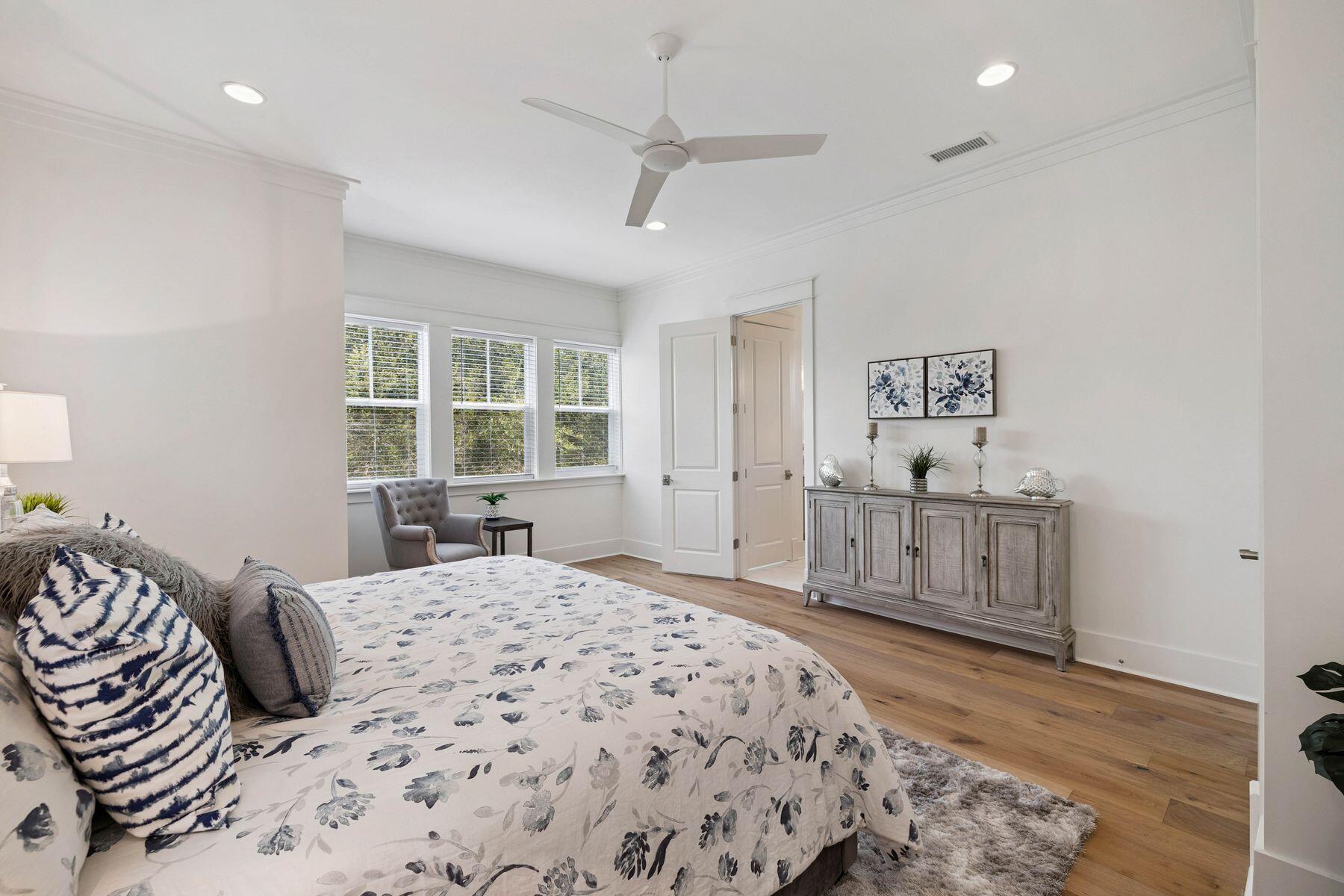 25 Pontchartrain North Santa Rosa Beach, FL 32459 - Photo 28 of 48 a bedroom with a large bed and a window