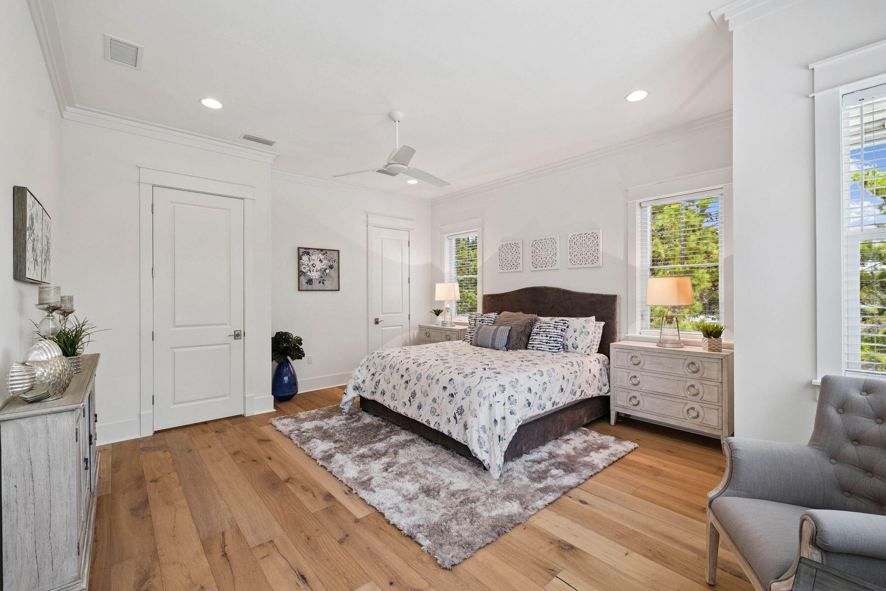 25 Pontchartrain North Santa Rosa Beach, FL 32459 - Photo 29 of 48 a spacious bedroom with a bed and a couch
