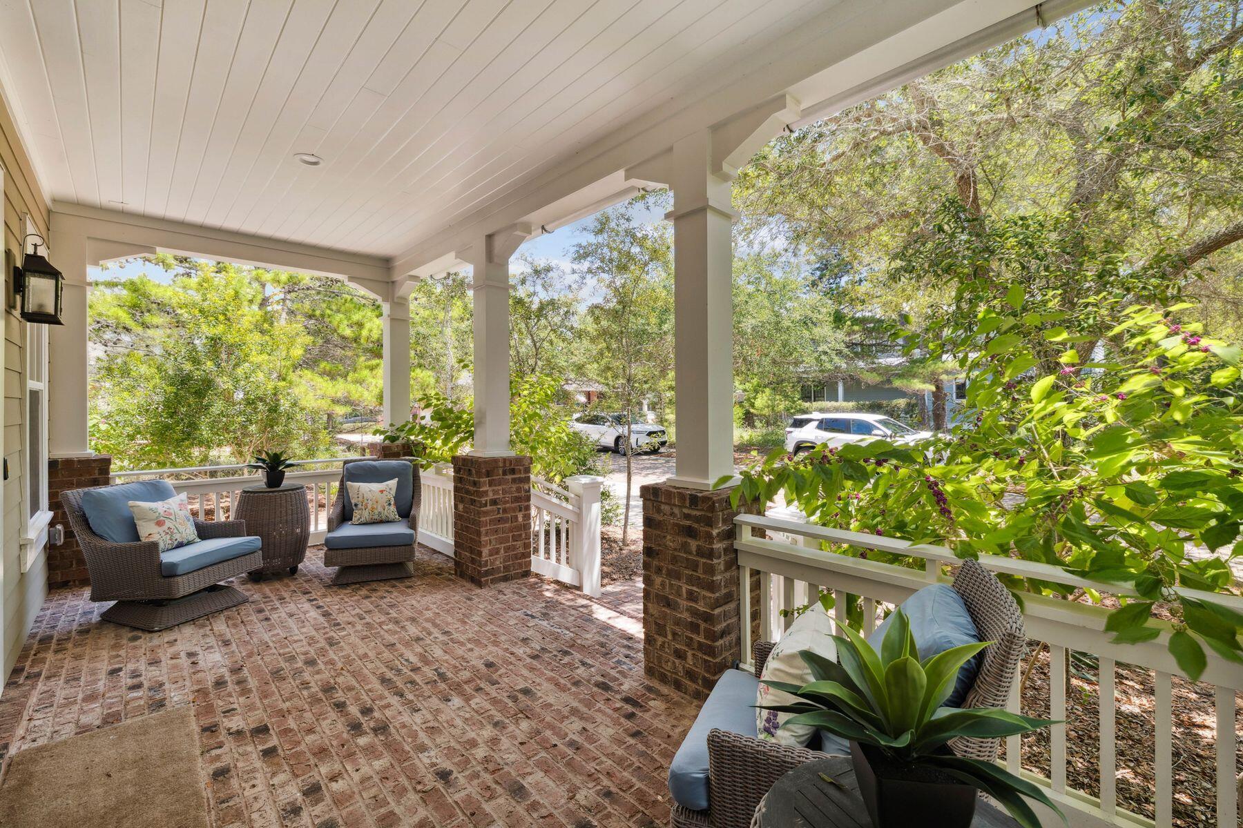 25 Pontchartrain North Santa Rosa Beach, FL 32459 - Photo 3 of 48 a living room filled with furniture and a potted plant