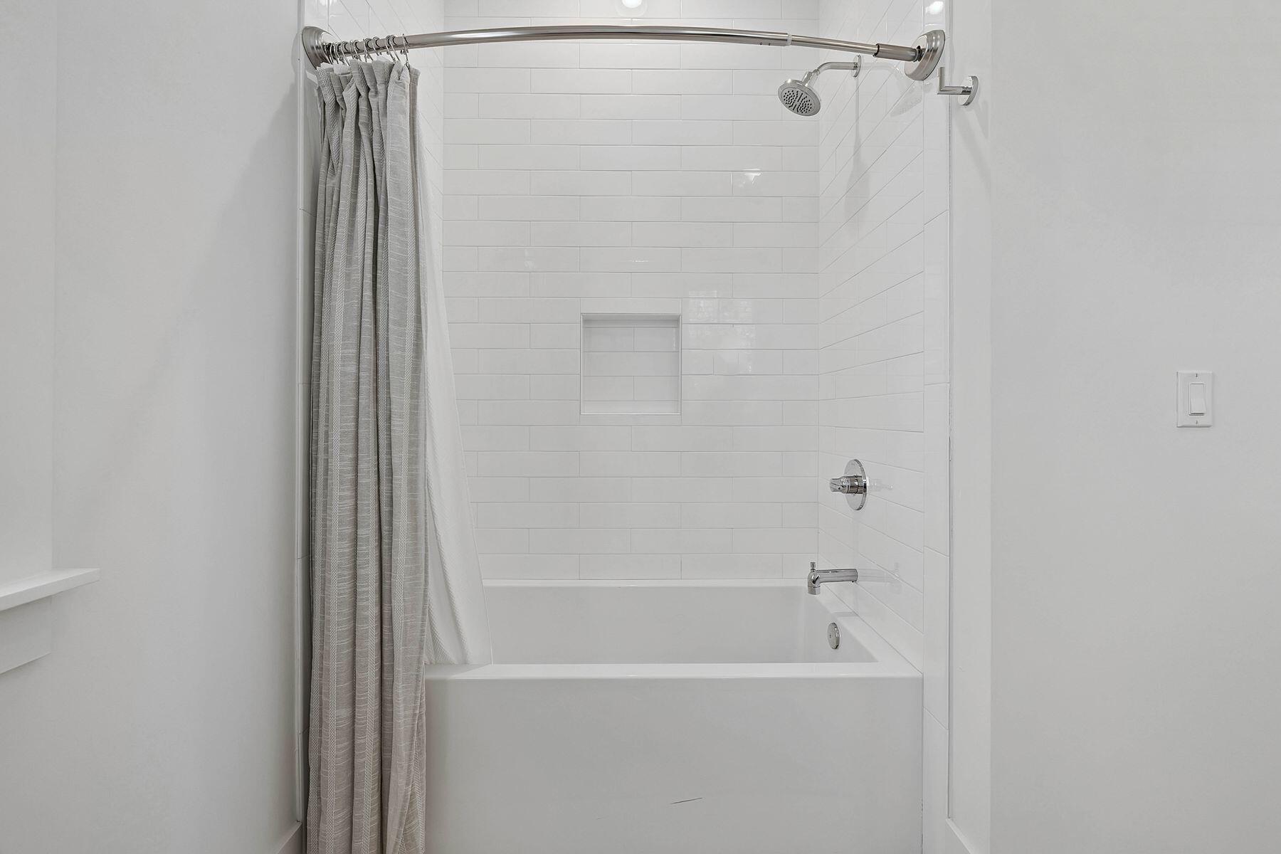 25 Pontchartrain North Santa Rosa Beach, FL 32459 - Photo 40 of 48 a bathroom with a bathtub and a shower