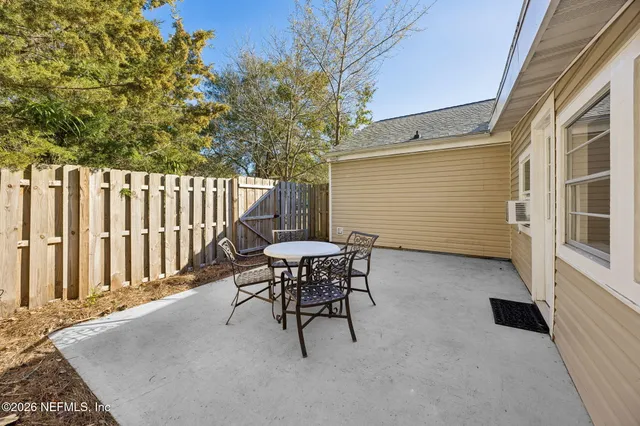 a house with trees in front of it