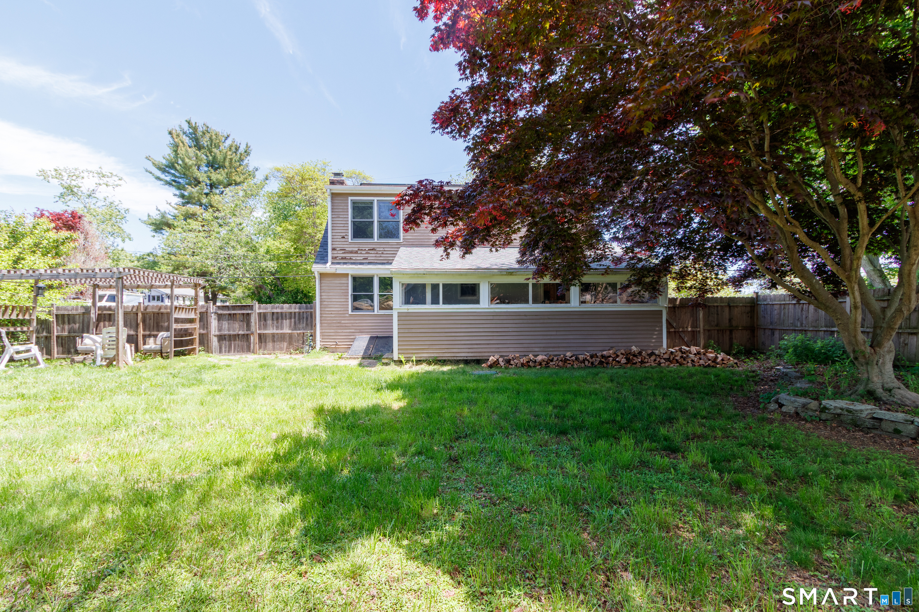 15 Bluff Avenue Clinton, CT 06413 - Photo 6 of 38 a backyard of a house with seating space