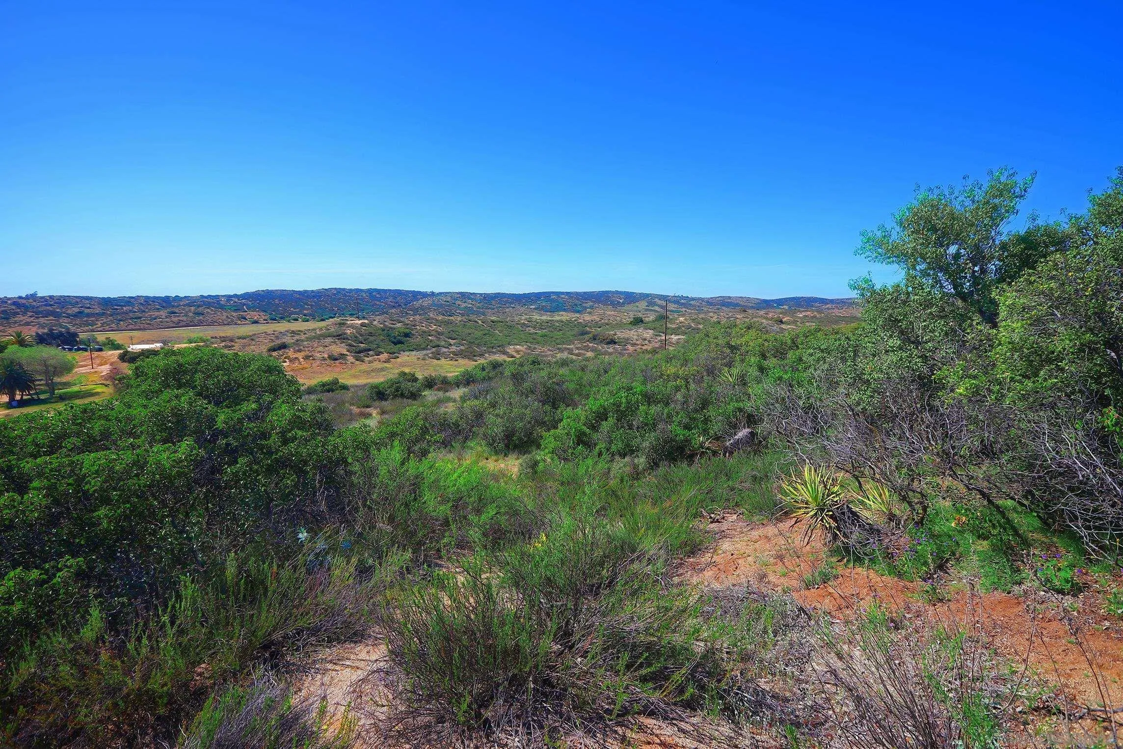 43000 Stanley Road Hemet, CA 92544 - Photo 54 of 67 a view of a city with lush green forest