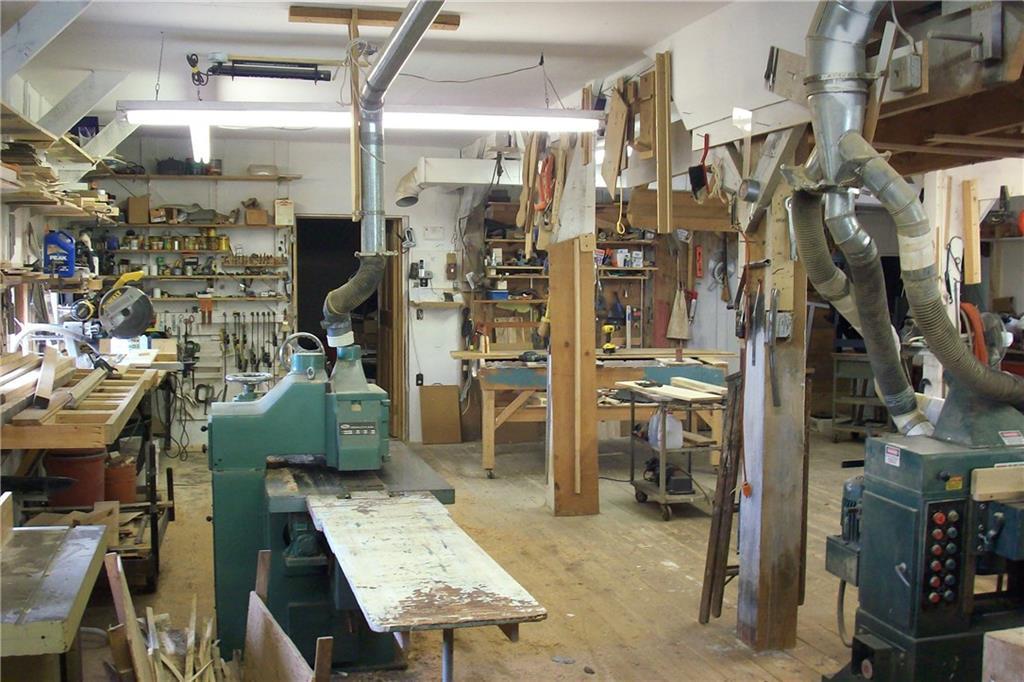 755 Pinnacle Road Liberty, ME 04949 - Photo 31 of 35 View through wood working shop