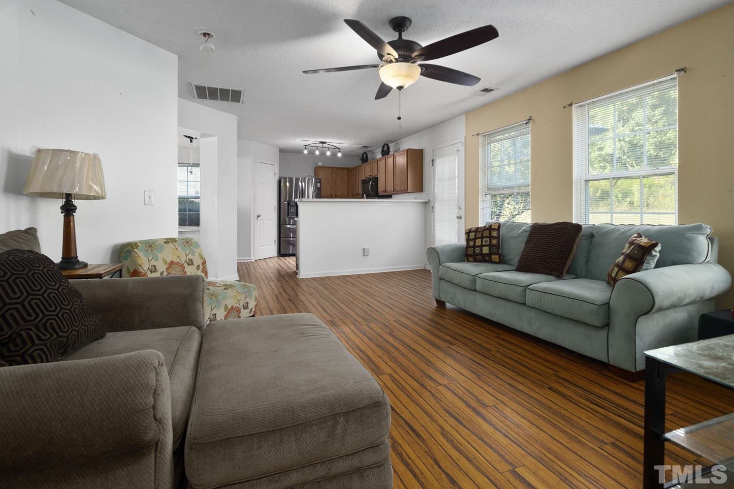 5904 Rivercliff Court Raleigh, NC 27610 - Photo 17 of 30 a living room with furniture and a window