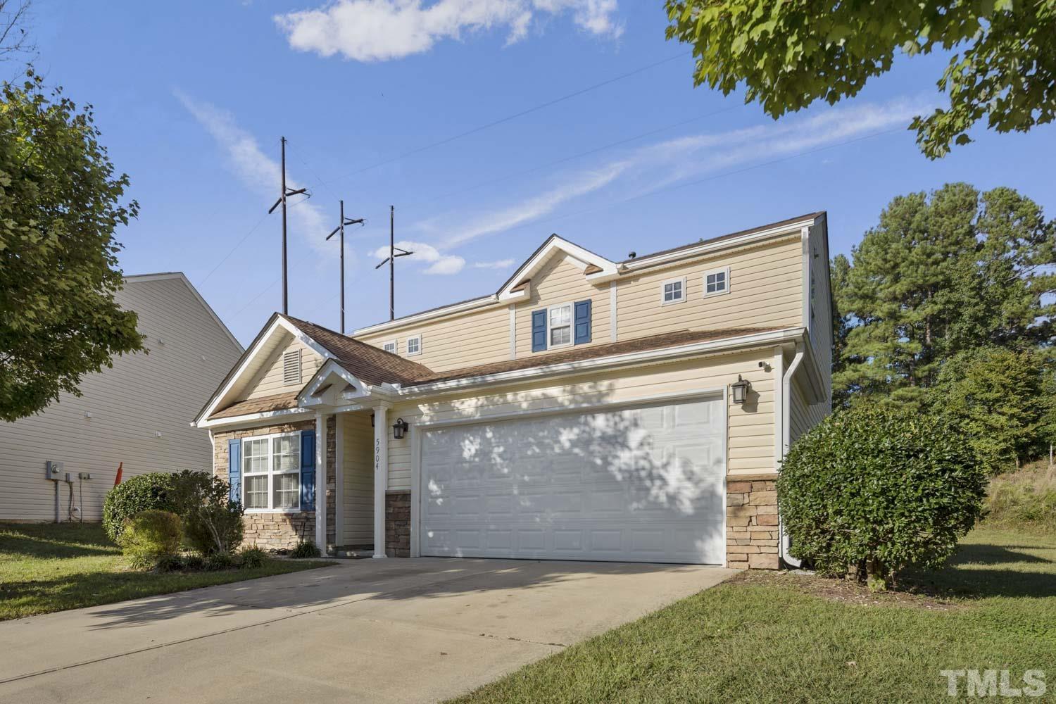 5904 Rivercliff Court Raleigh, NC 27610 - Photo 2 of 30 a view of a house with a yard and plants