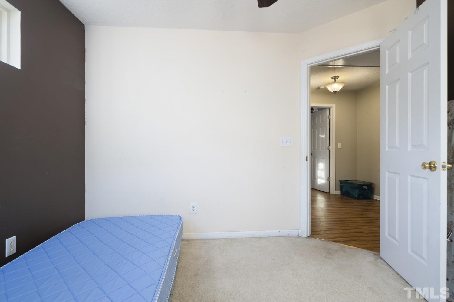 5904 Rivercliff Court Raleigh, NC 27610 - Photo 24 of 30 a view of hallway with wooden floor