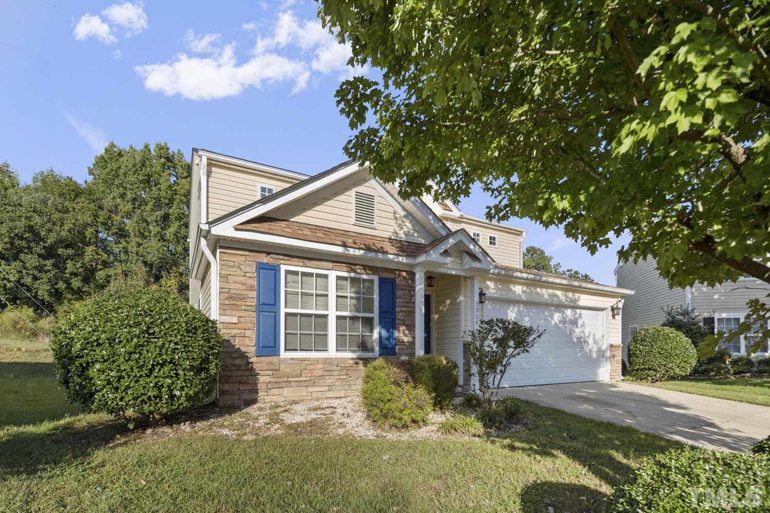 5904 Rivercliff Court Raleigh, NC 27610 - Photo 4 of 30 front view of a house with a yard