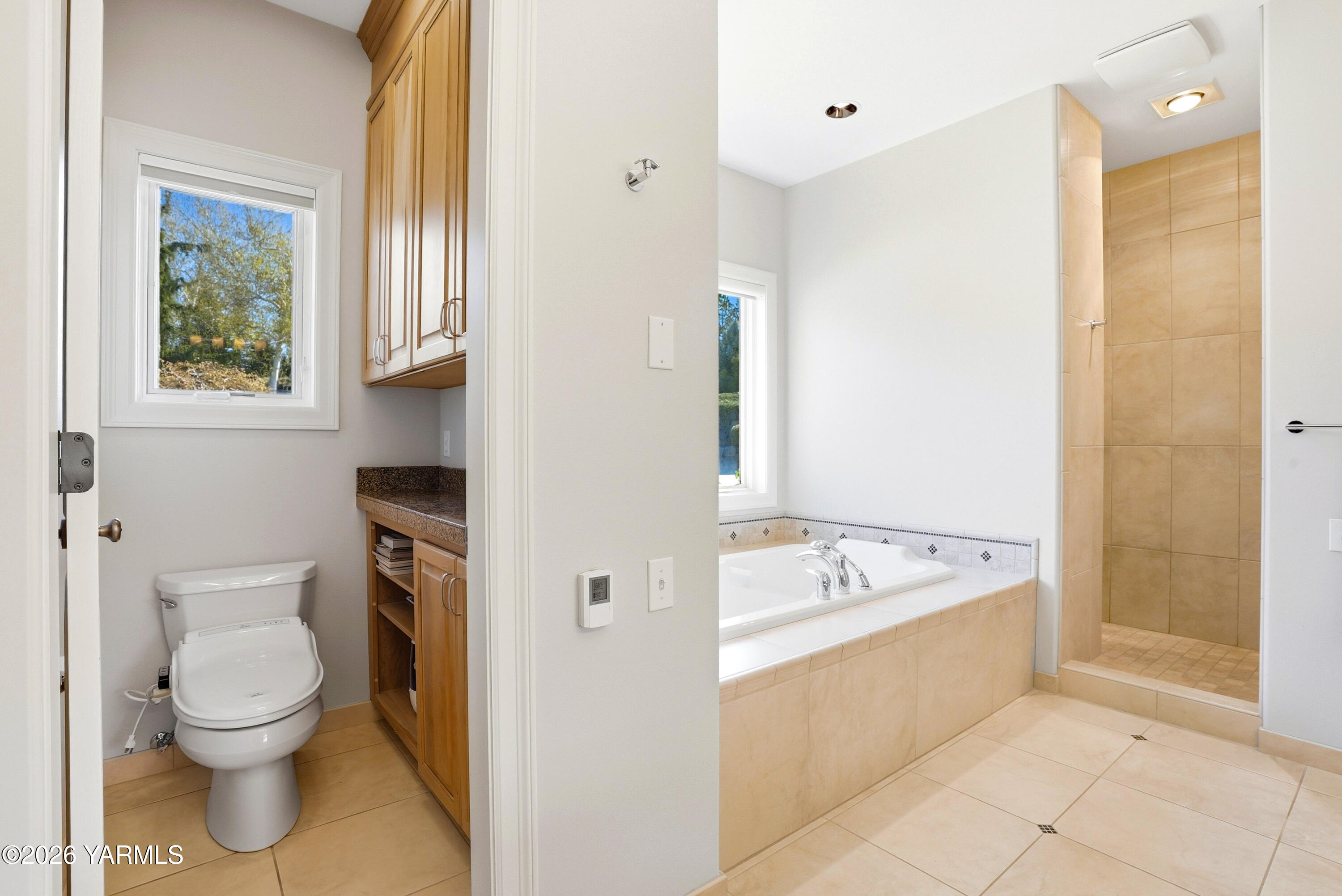 660 Noble Hill Road Yakima, WA 98908 - Photo 25 of 63 a bathroom with a sink a toilet and shower