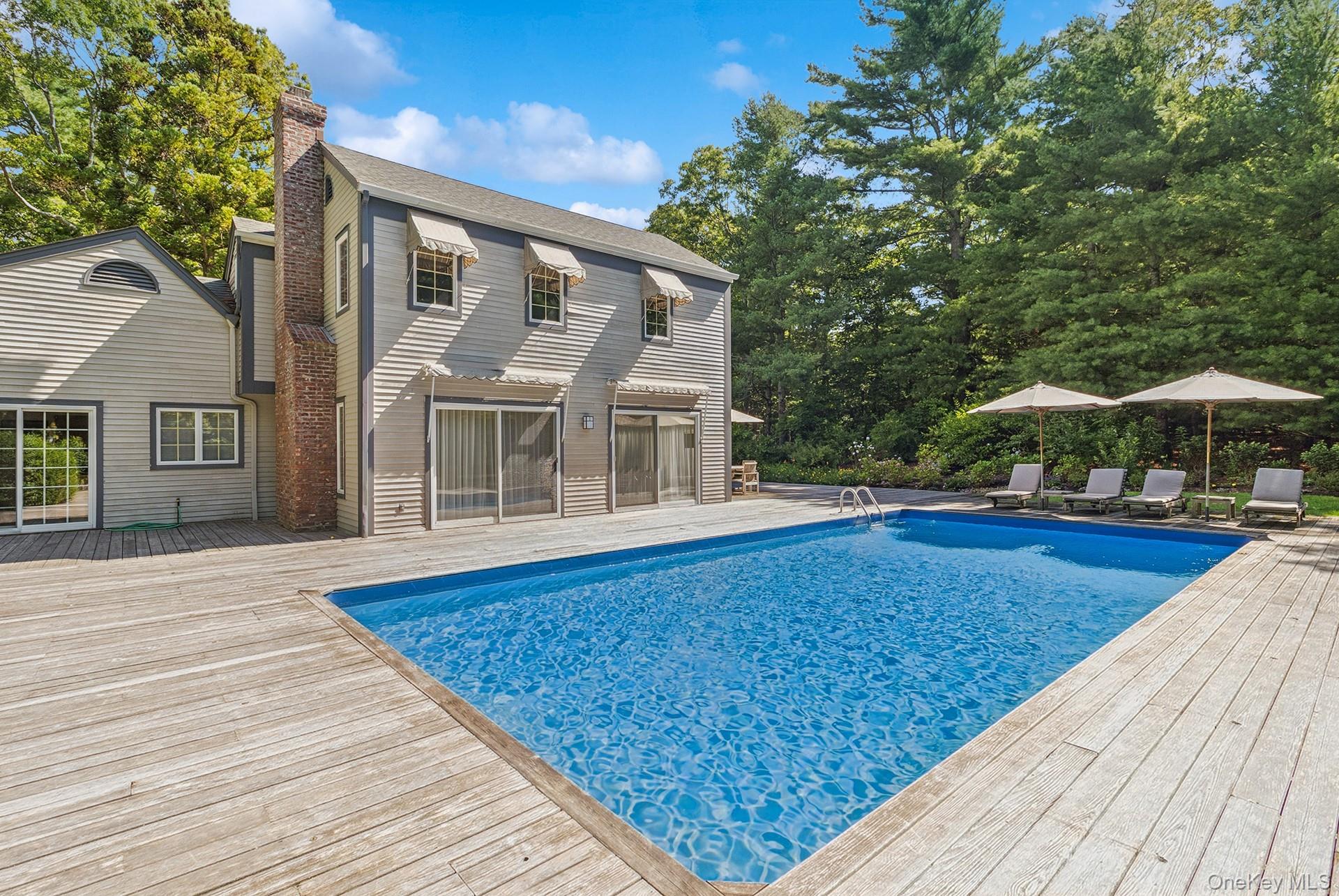 530 Hands Creek Road East Hampton, NY 11937 - Photo 7 of 47 Outdoor pool featuring a deck