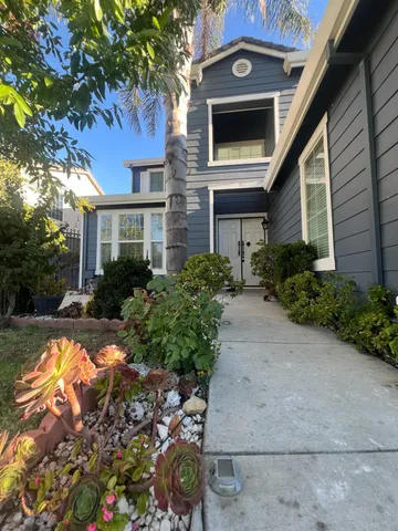 a room with a sink and a mirror