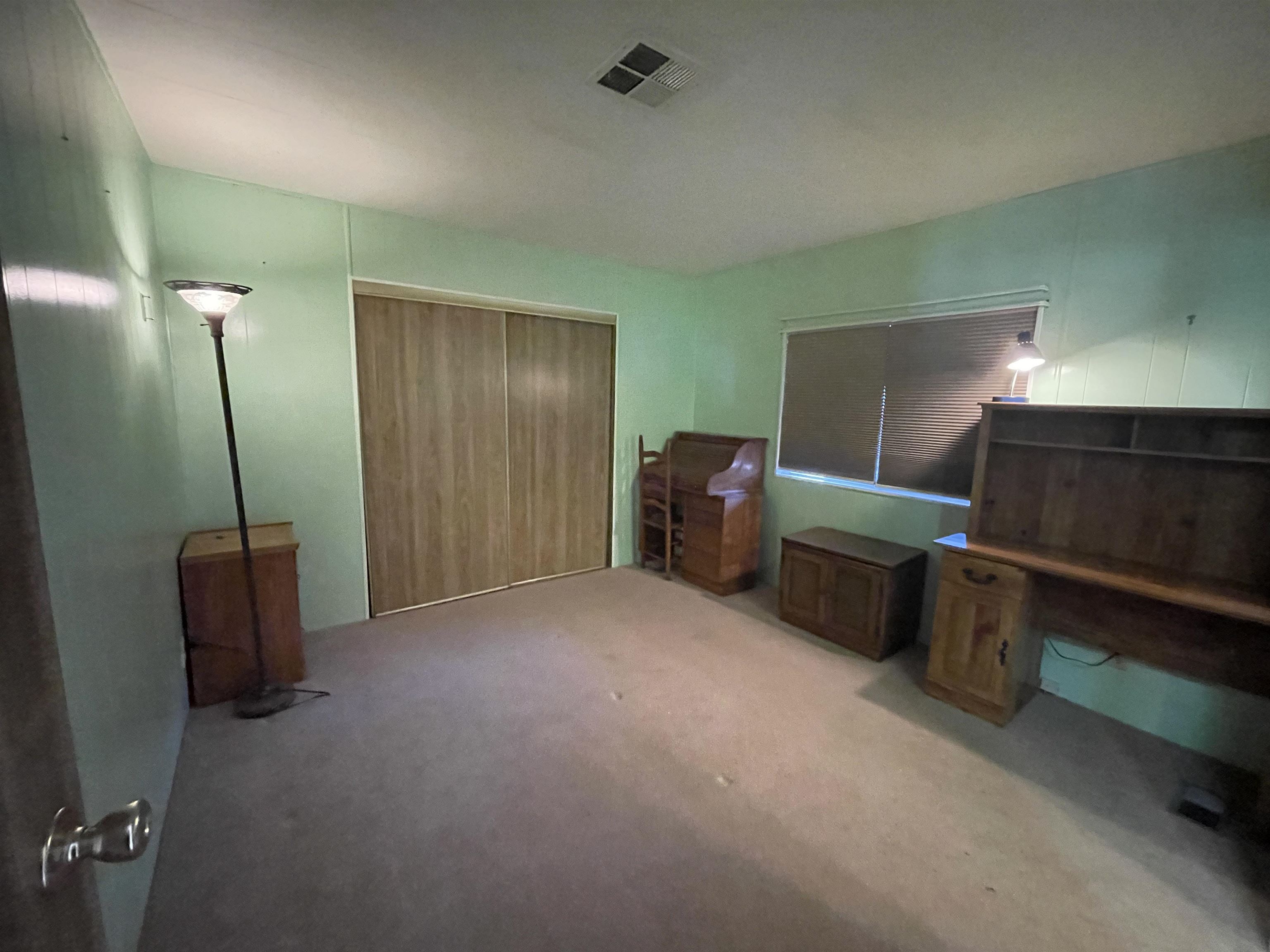 10956 Green Street, Unit 218 Columbia, CA 95310 - Photo 15 of 21 a view of livingroom with furniture and windows