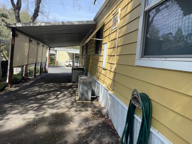 a view of a porch with furniture