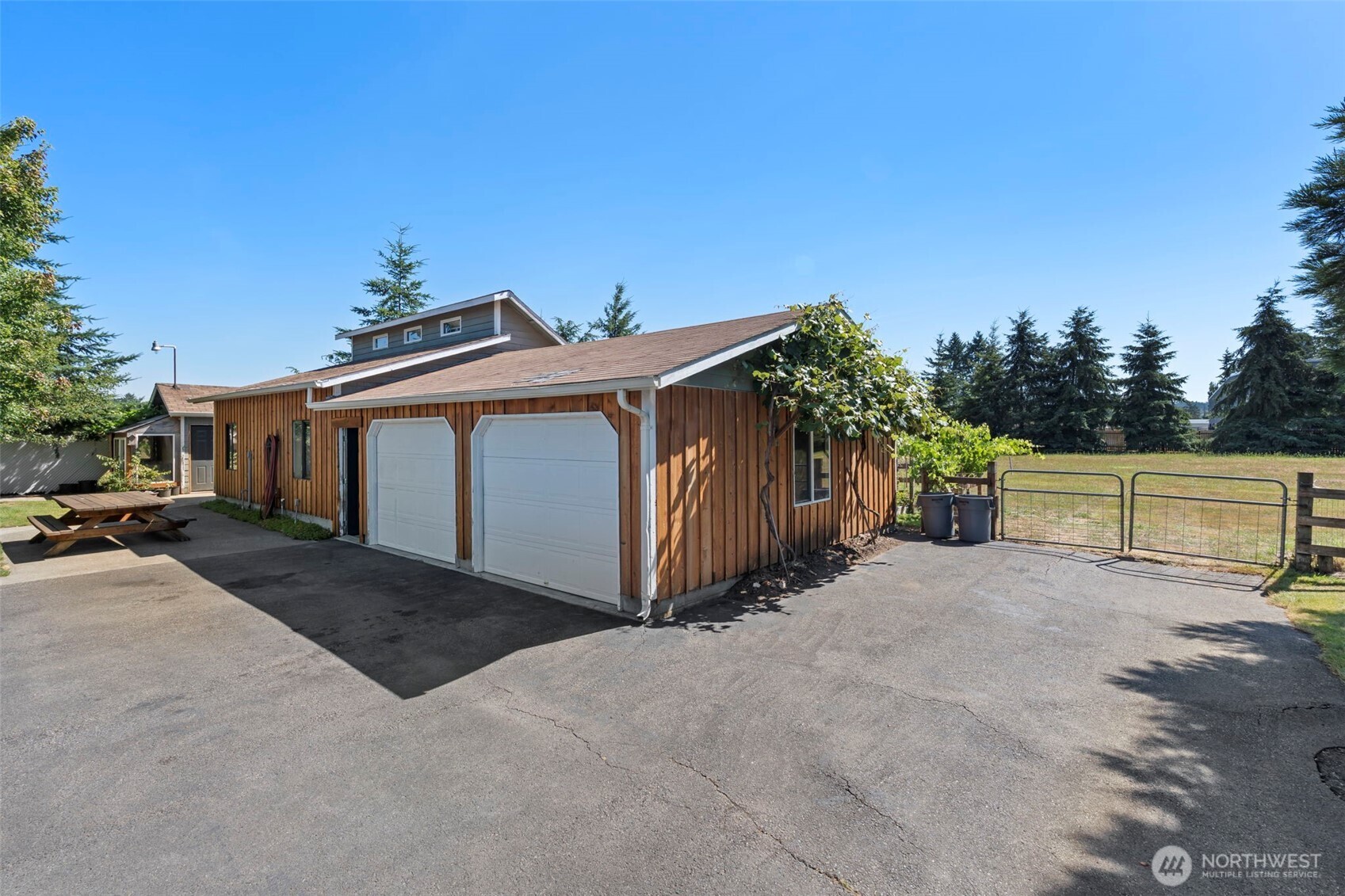 2118 Gallagher Road Centralia, WA 98531 - Photo 28 of 40 a view of a house with a yard and garage