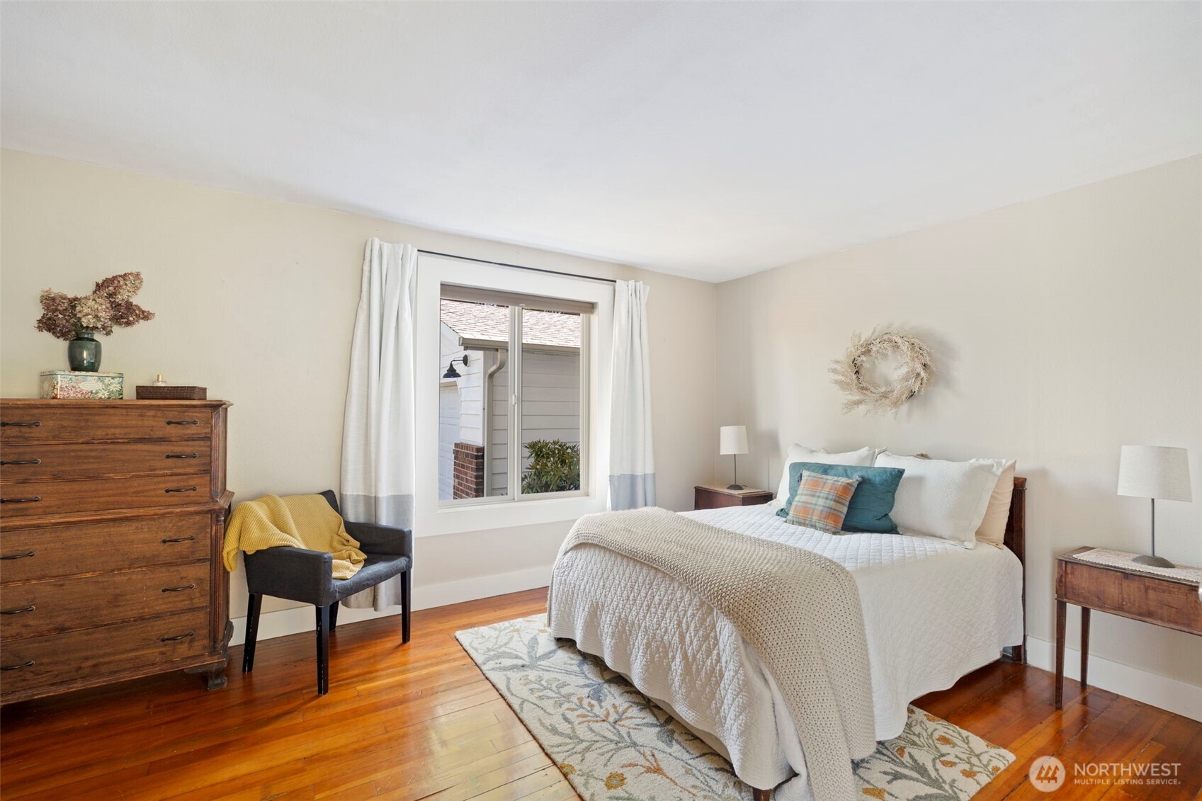 2118 Gallagher Road Centralia, WA 98531 - Photo 3 of 40 a bedroom with a bed and wooden floor