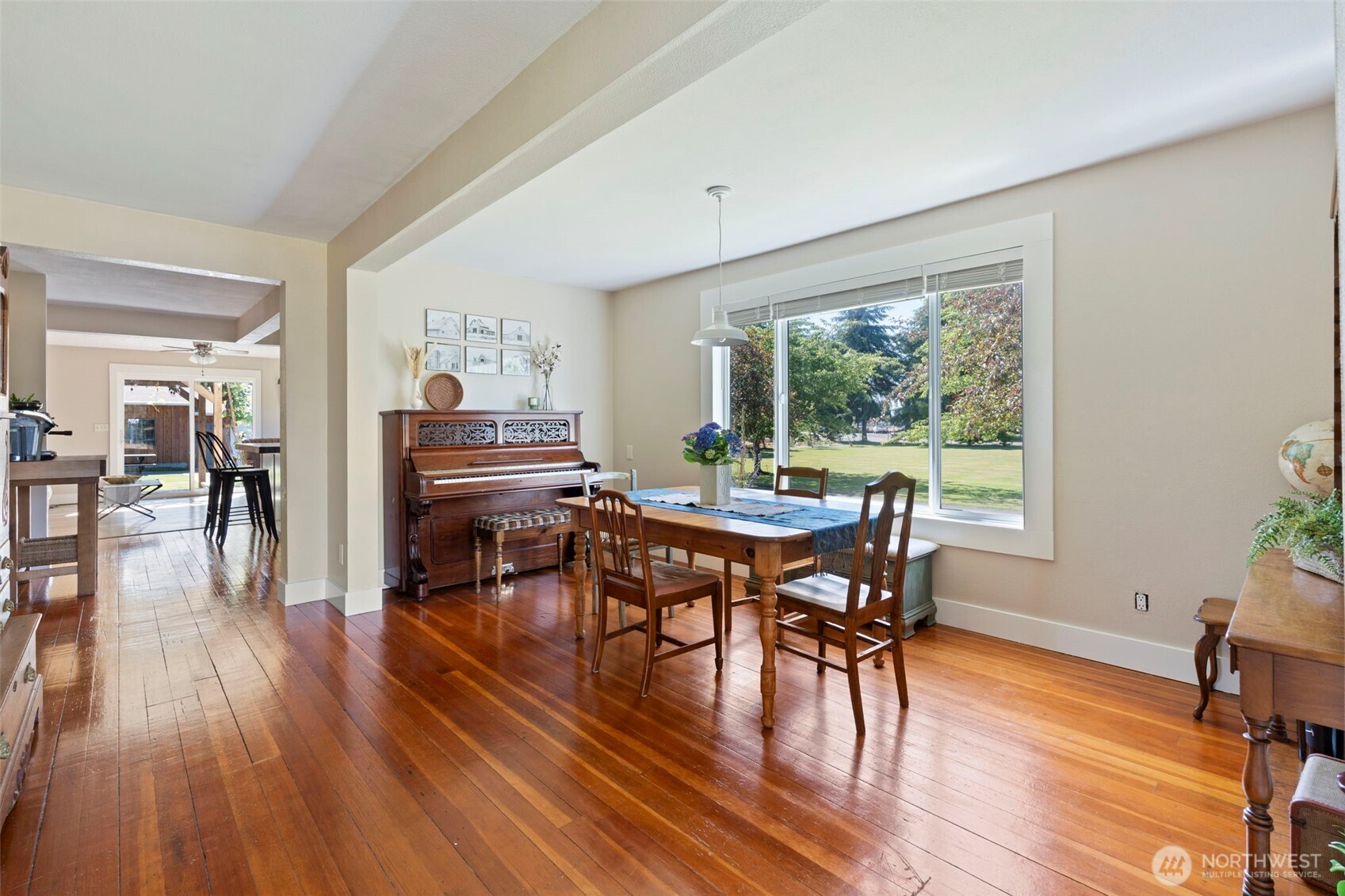 2118 Gallagher Road Centralia, WA 98531 - Photo 7 of 40 a view of a dining room with furniture window and wooden floor