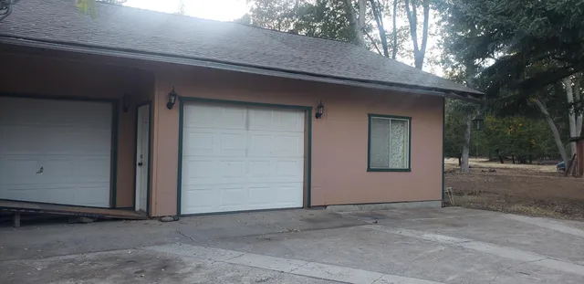 a view of backyard with green space