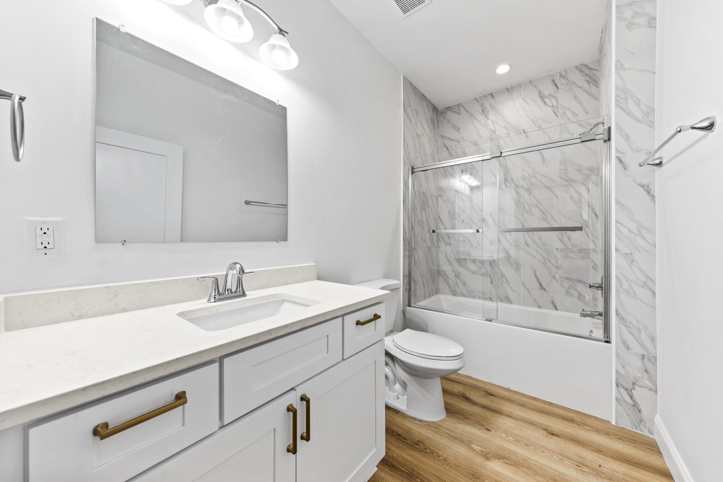 60 4th Street Santa Rosa Beach, FL 32459 - Photo 5 of 22 a bathroom with a sink a toilet and a bathtub