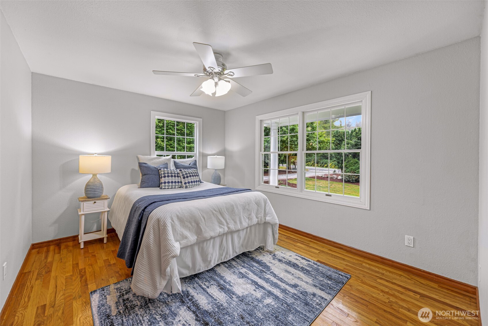 9067 Sunrise Road Custer, WA 98240 - Photo 16 of 40 a bedroom with a bed and a window