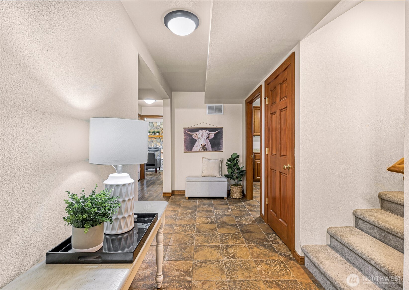 9067 Sunrise Road Custer, WA 98240 - Photo 18 of 40 a lobby with furniture and a potted plant
