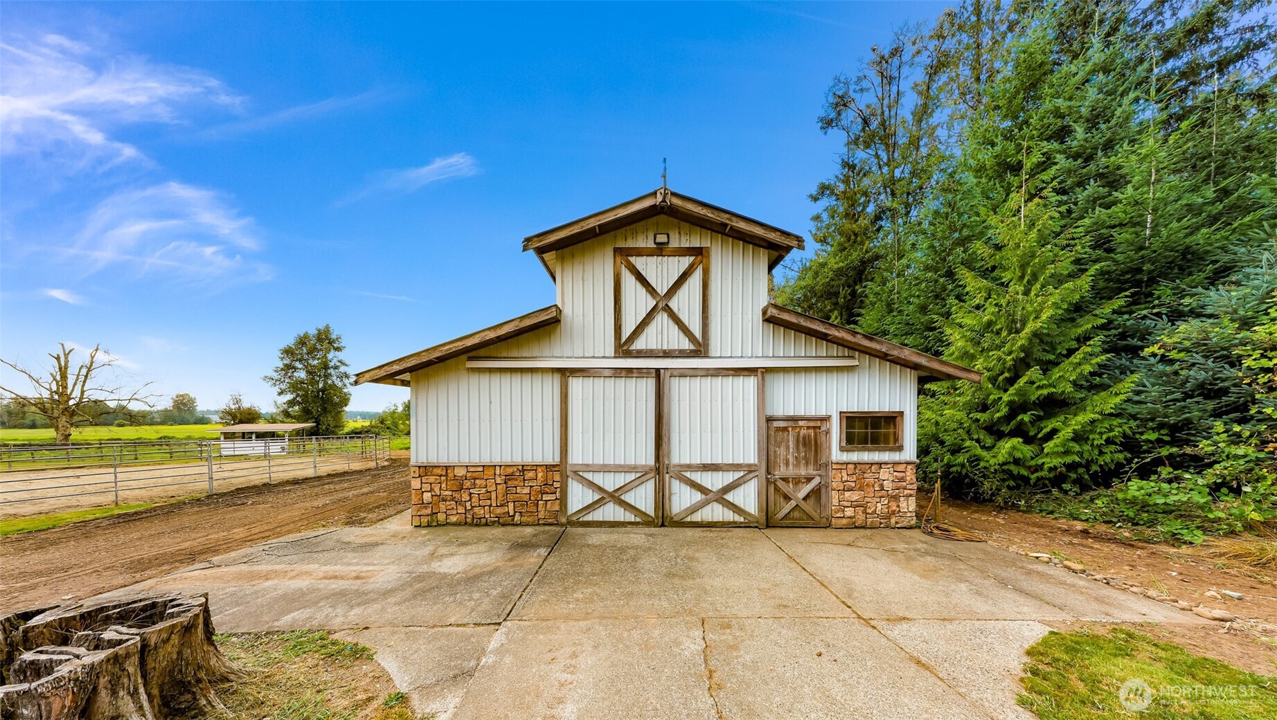9067 Sunrise Road Custer, WA 98240 - Photo 32 of 40 a view of a house with a yard and potted plants