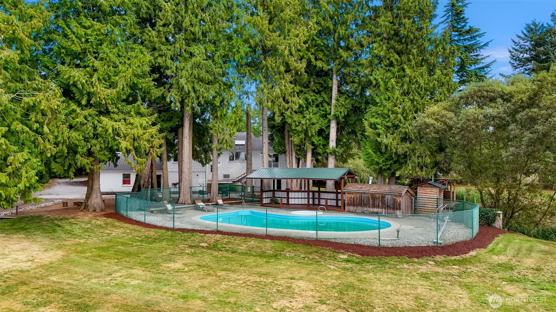 9067 Sunrise Road Custer, WA 98240 - Photo 36 of 40 a view of a house with swimming pool