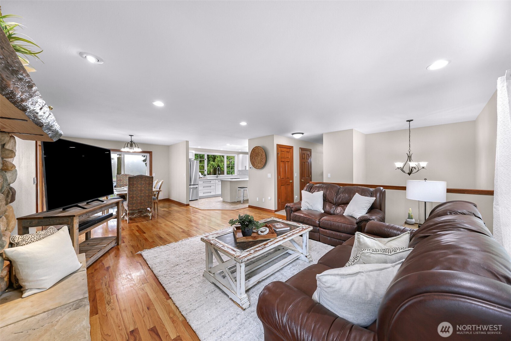 9067 Sunrise Road Custer, WA 98240 - Photo 5 of 40 a living room with furniture and a flat screen tv