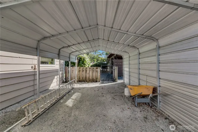 a view of a backyard with sitting area